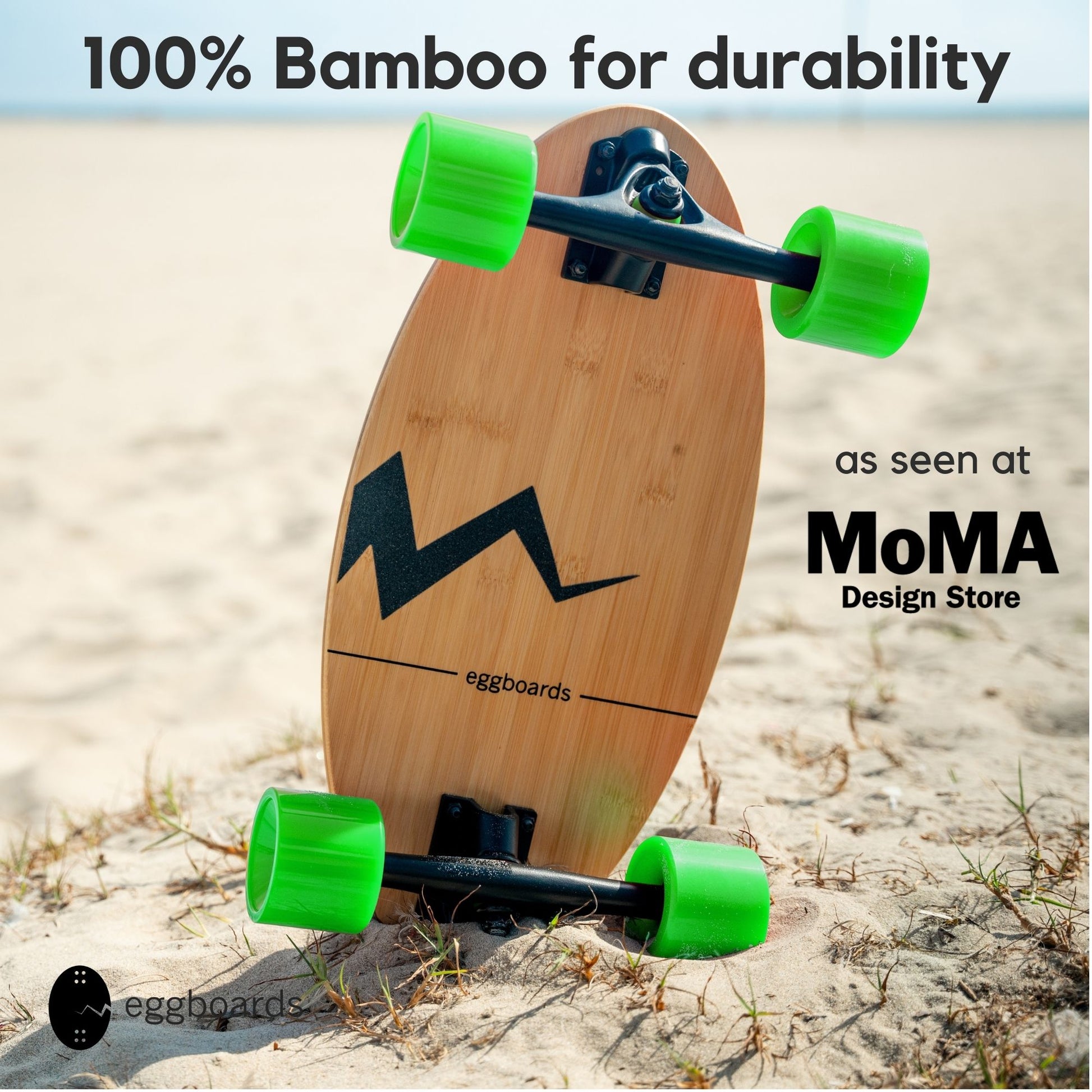 griptape resting on the sand at Venice Beach, California. The overlay text highlights "100% bamboo for durability" and "as seen at the MoMA Design Store."