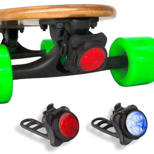 Close-up of an Eggboard cruiser skateboard with the red LED tail light on, highlighting the back light of the Blue-Red LED Skateboard Lights set.